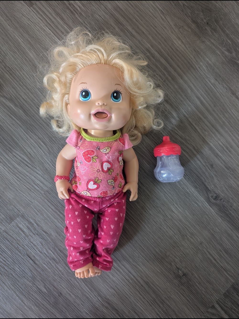 Blonde Baby Alive Doll in Pink Heart Outfit with Bottle